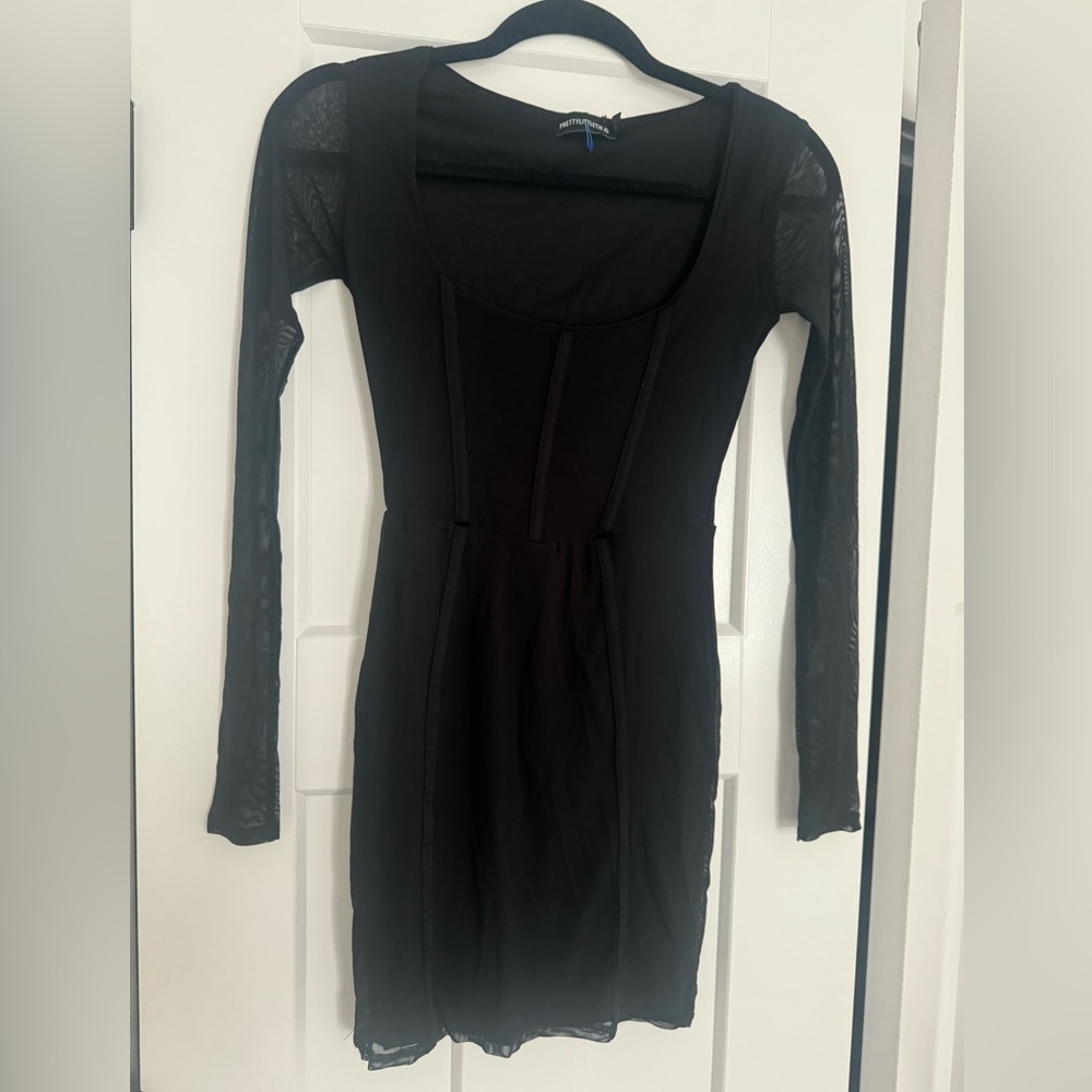 NWOT, never worn, excellent condition, xs black sexy dress